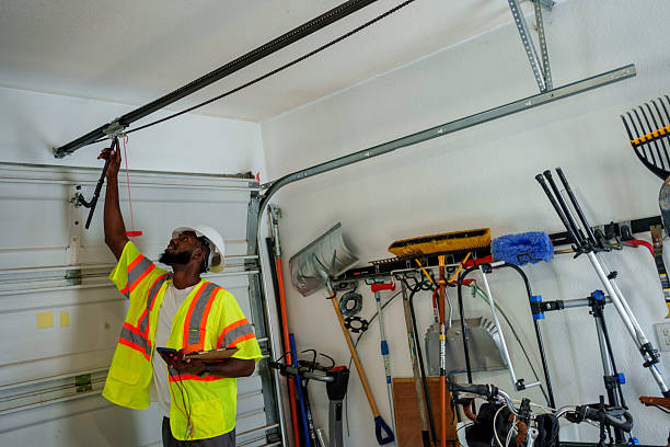 Professional Garage Door Panel Replacement technician working in Saylorville, IA